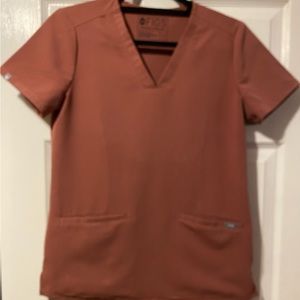 Figs top scrubs in mint condition. Coral color